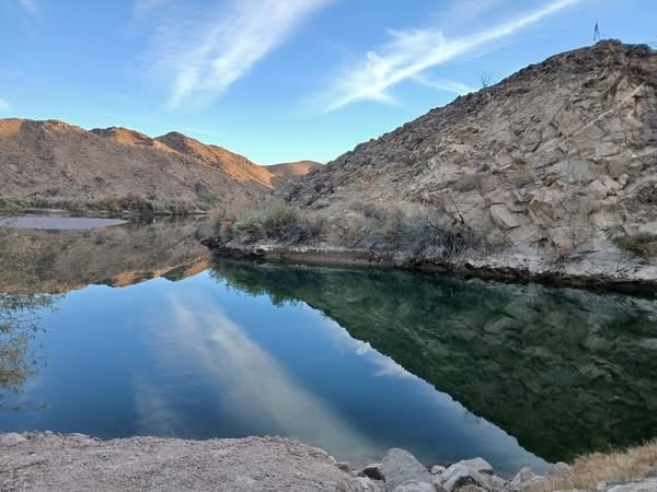 Mittry lake is a clear lake in the desert surrounded by small mountains in Yuma, Arizona.