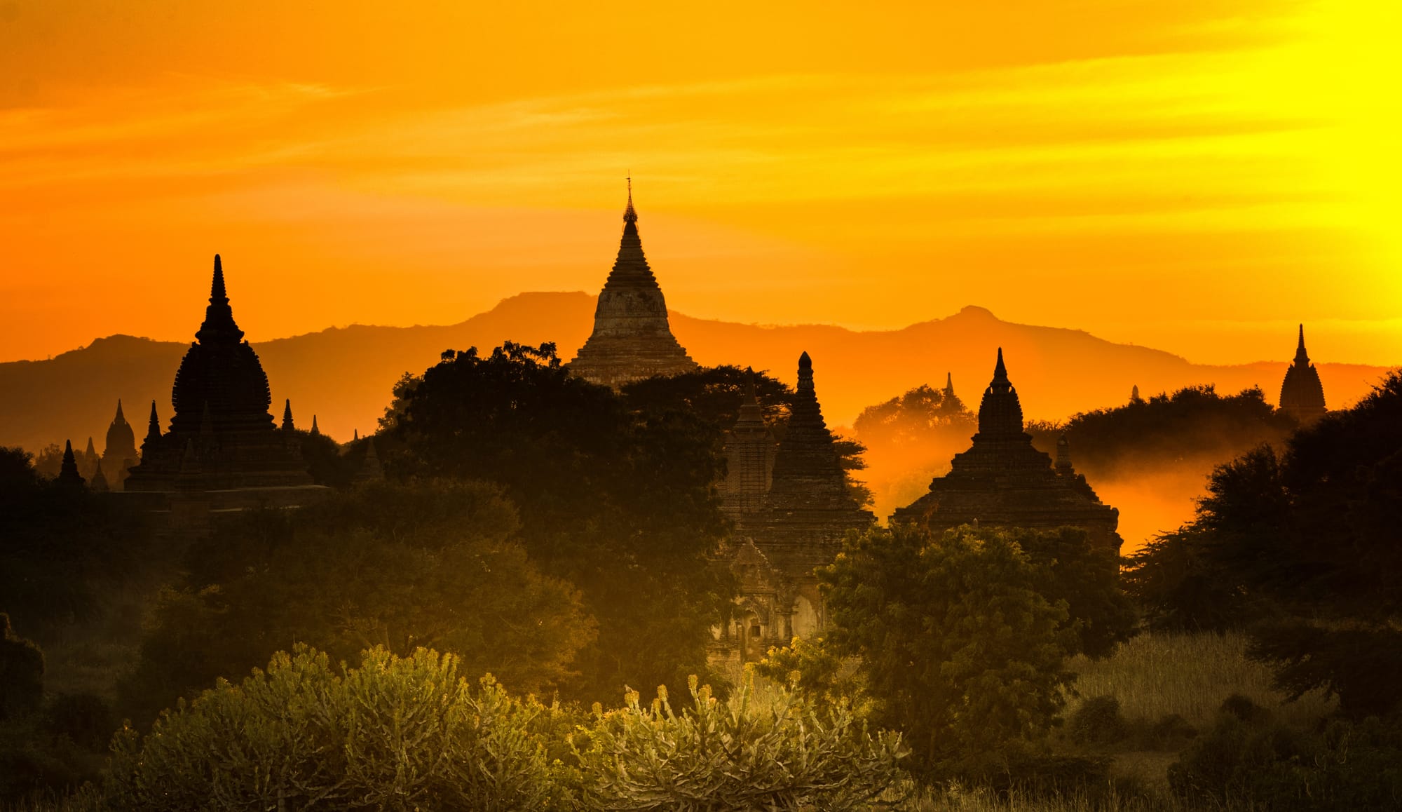 Golden sunset over temples in Bagan, Myanmar.
