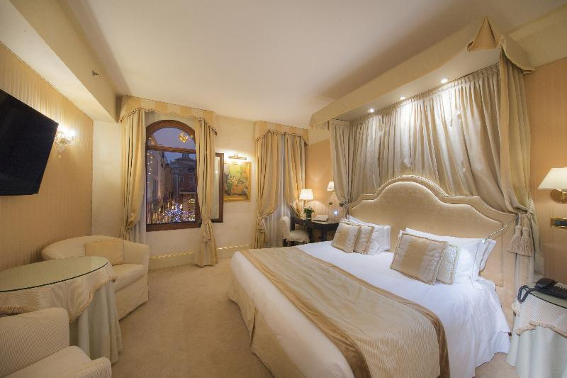 A guest room at Hotel A la Commedia in Venice, Italy.