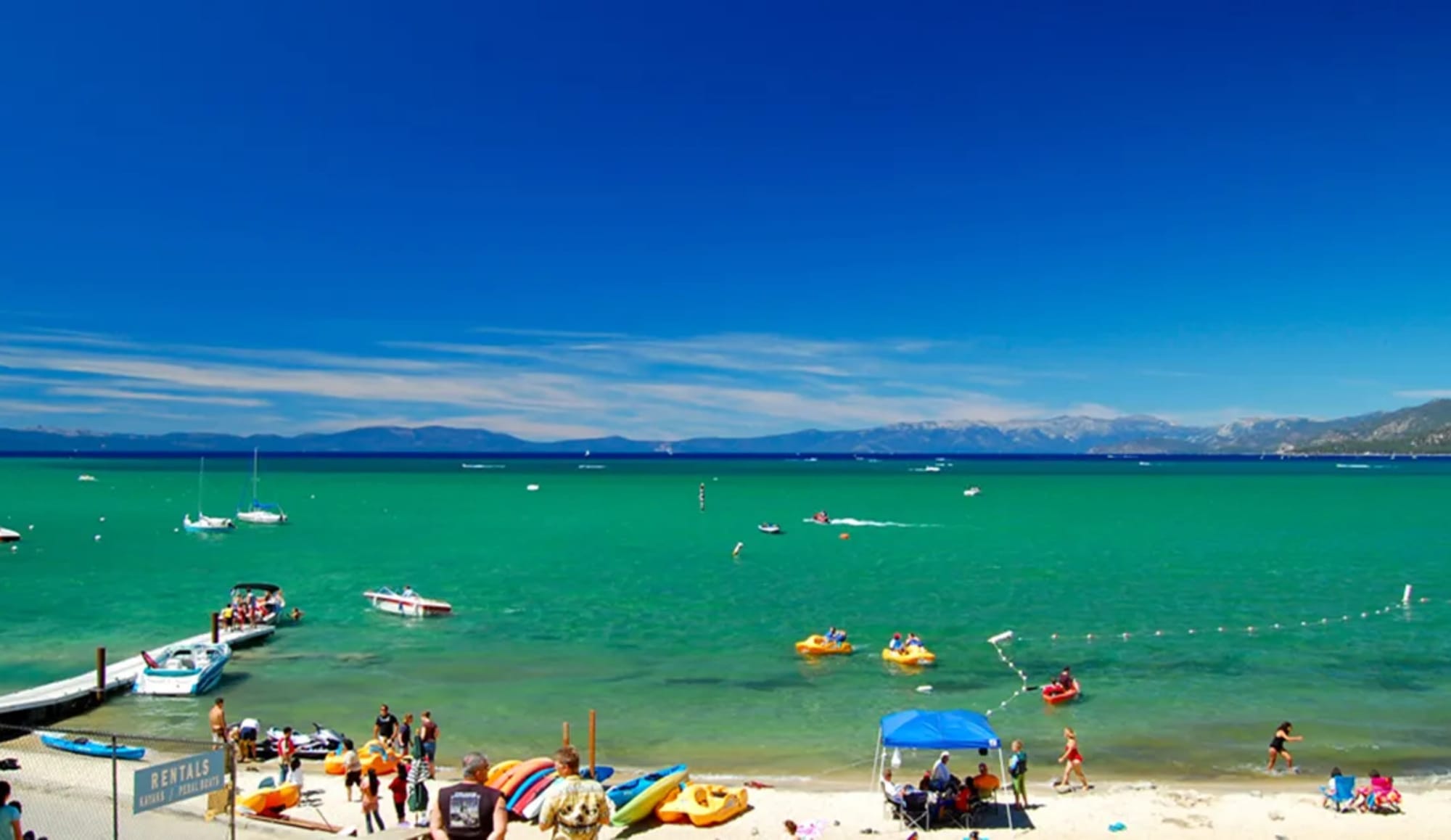 People playing on Kings Beach on Lake Tahoe.