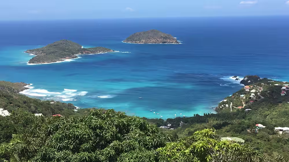 Ariel view of Northside region of St. Thomas with view of two small islands off the coast.