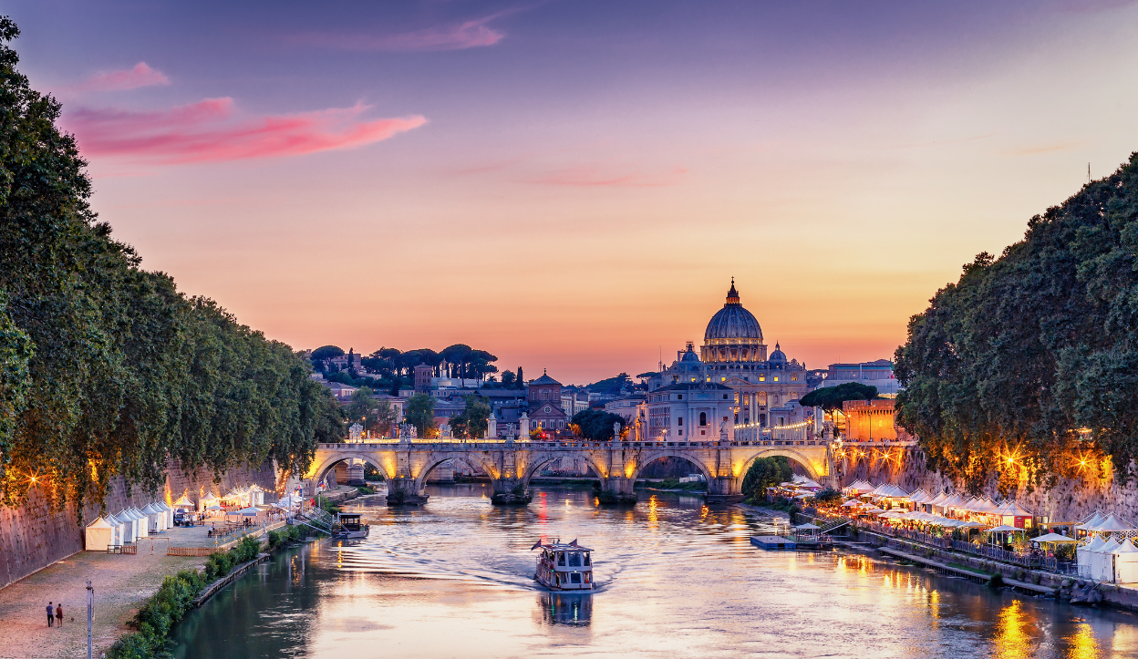 A boat going up the river in Rome, Italy.