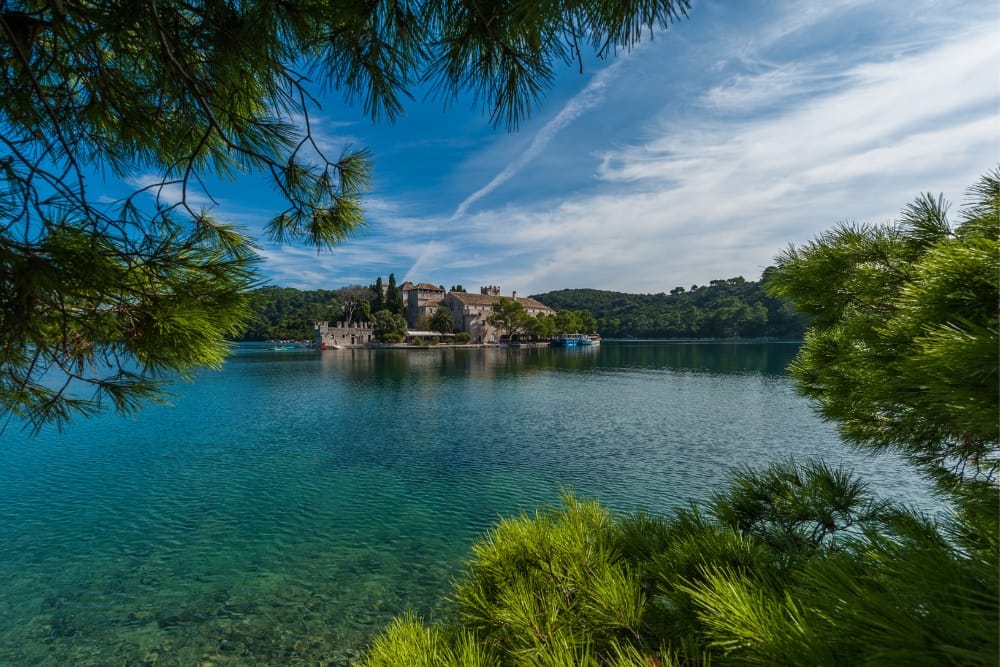 A beautiful building on the water in Mljet National Park.