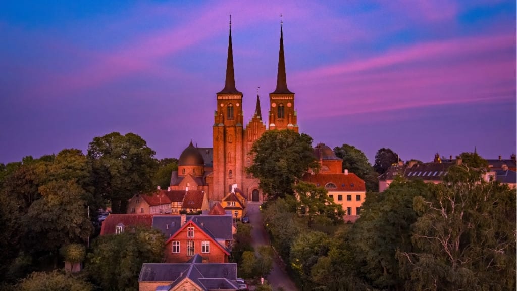 Sunset in Denmark at the Roskilde Cathedral.