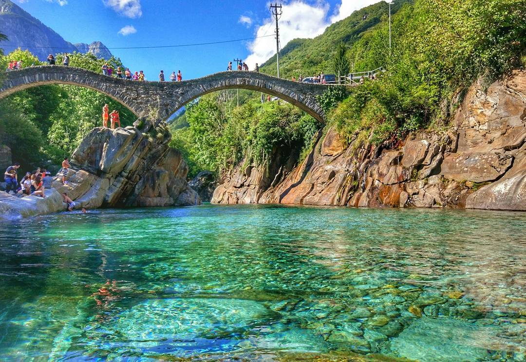 Beautiful clear waters under a bridge in Switzerland.