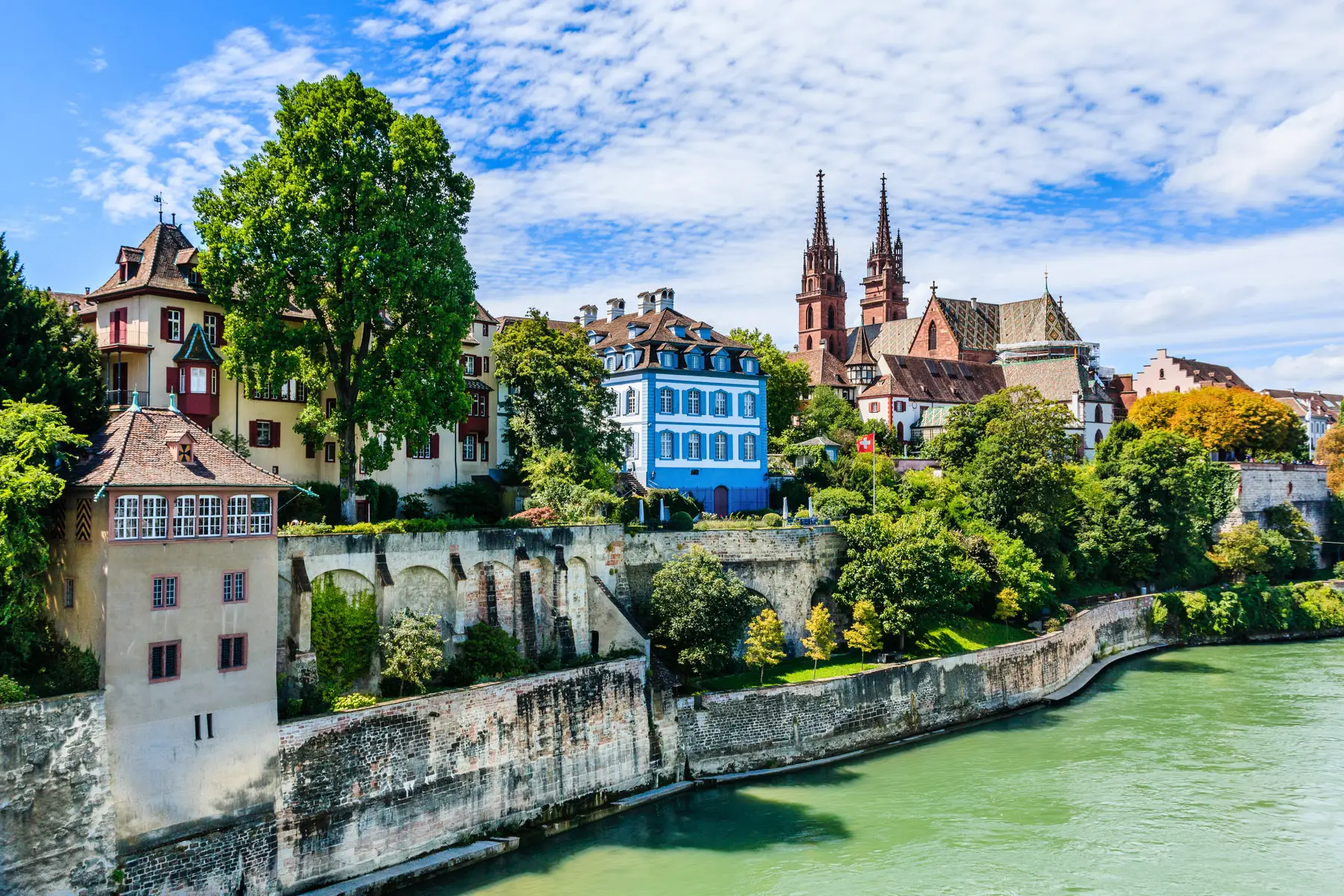 Basel Switzerland riverside with pretty buildings.