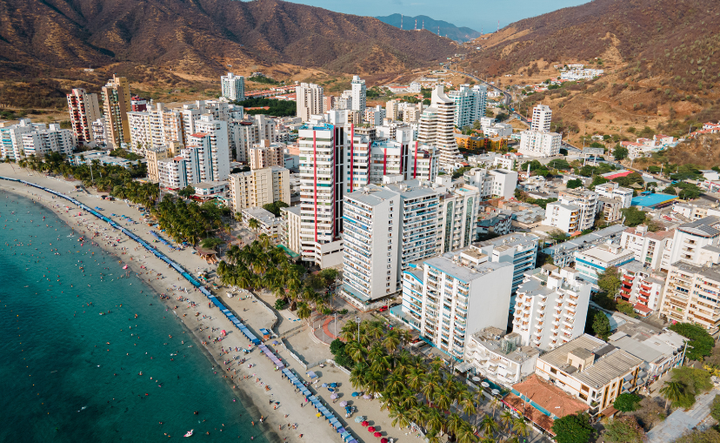 Ariel view of Santa Marta, Colombia's coastline with a beautiful beach and clear waters 