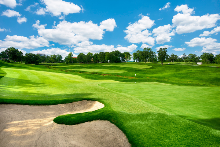 Thousand Hills Golf Course In Branson, Mo on a partly cloudy summer day.