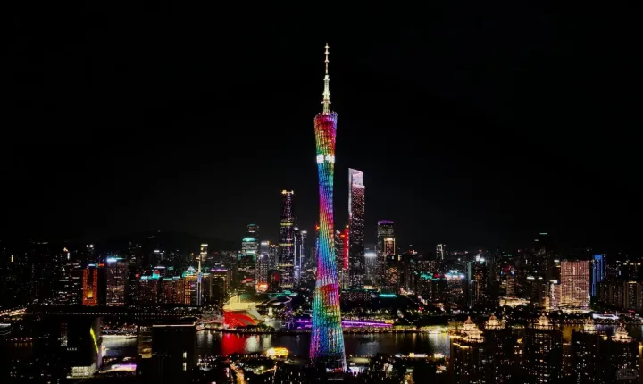 Cannon tower lit up at night in Guangzhou, China.