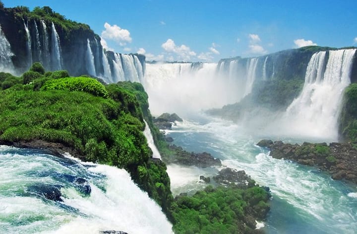 Large waterfall in Argentina on a sunny day.
