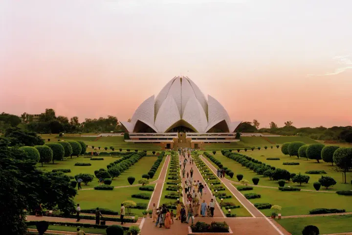 People looking at mordern architecture in India. 