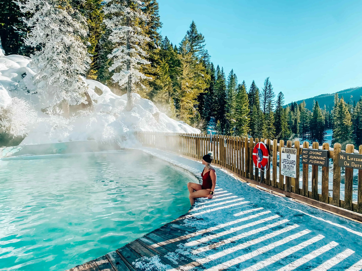 Girl in swimsuit by hot tub in Jackson Hole, WY