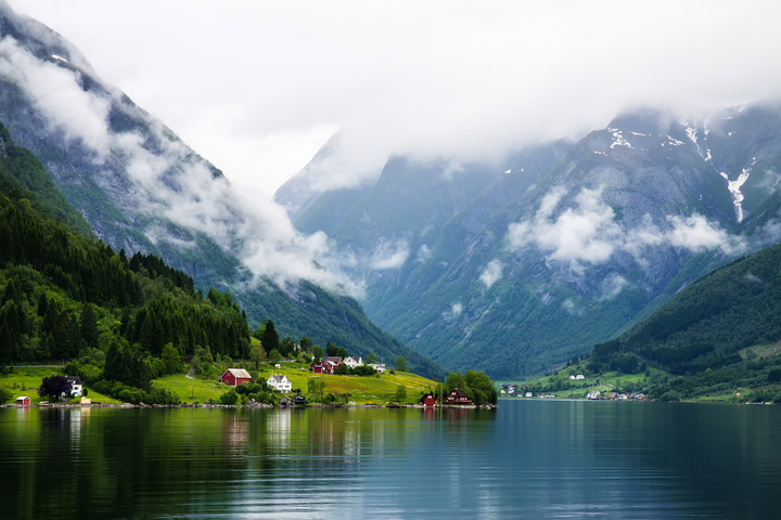 A beautiful lake in Scandinavia surrounded by mountains.