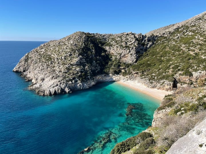 A beautiful beach in Albania with clear waters and white sand.
