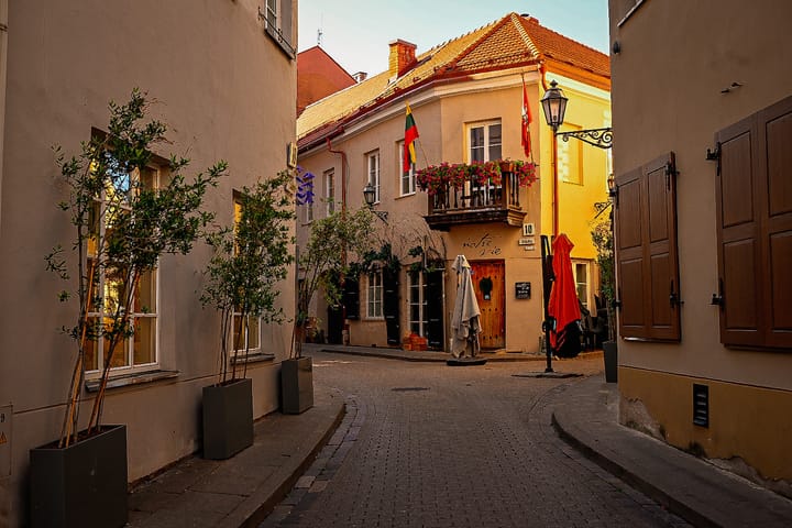 Ally in Vilnius, Lithuania with cobblestone streets. 