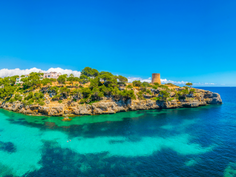 Beautiful clear blue waters of Cala Pi bay in Mallorca, Spain
